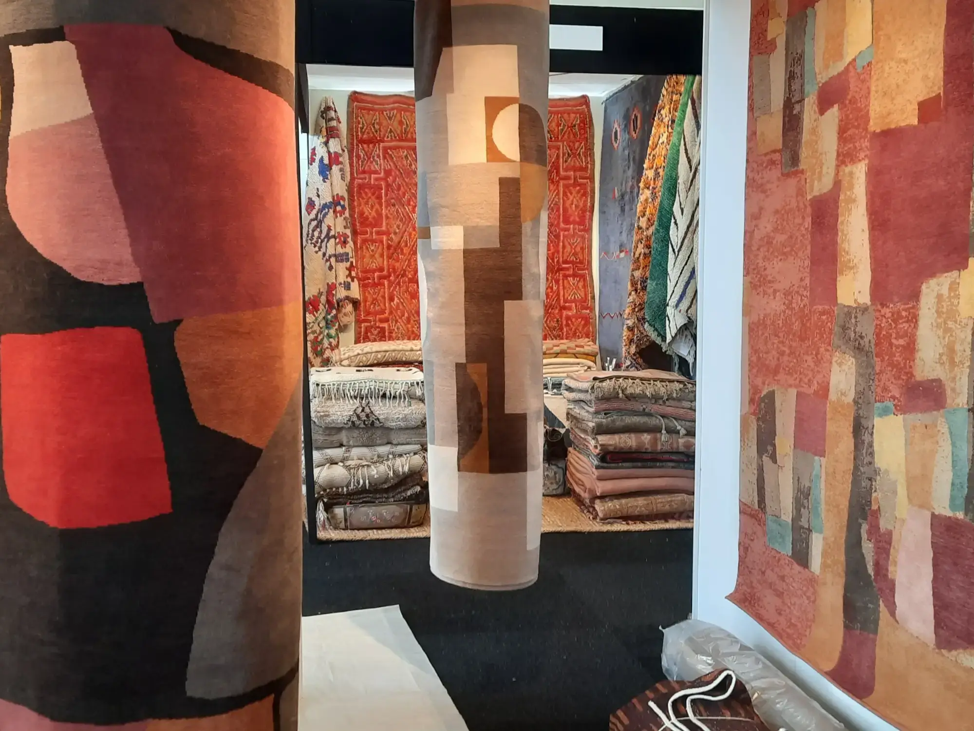 Dealer stand with antique rugs at LARTA